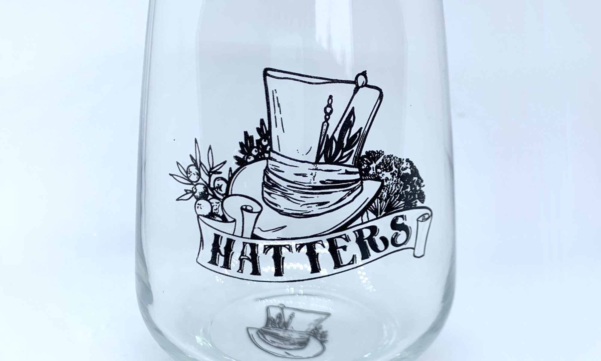 Stemless gin glass with Hatters logo