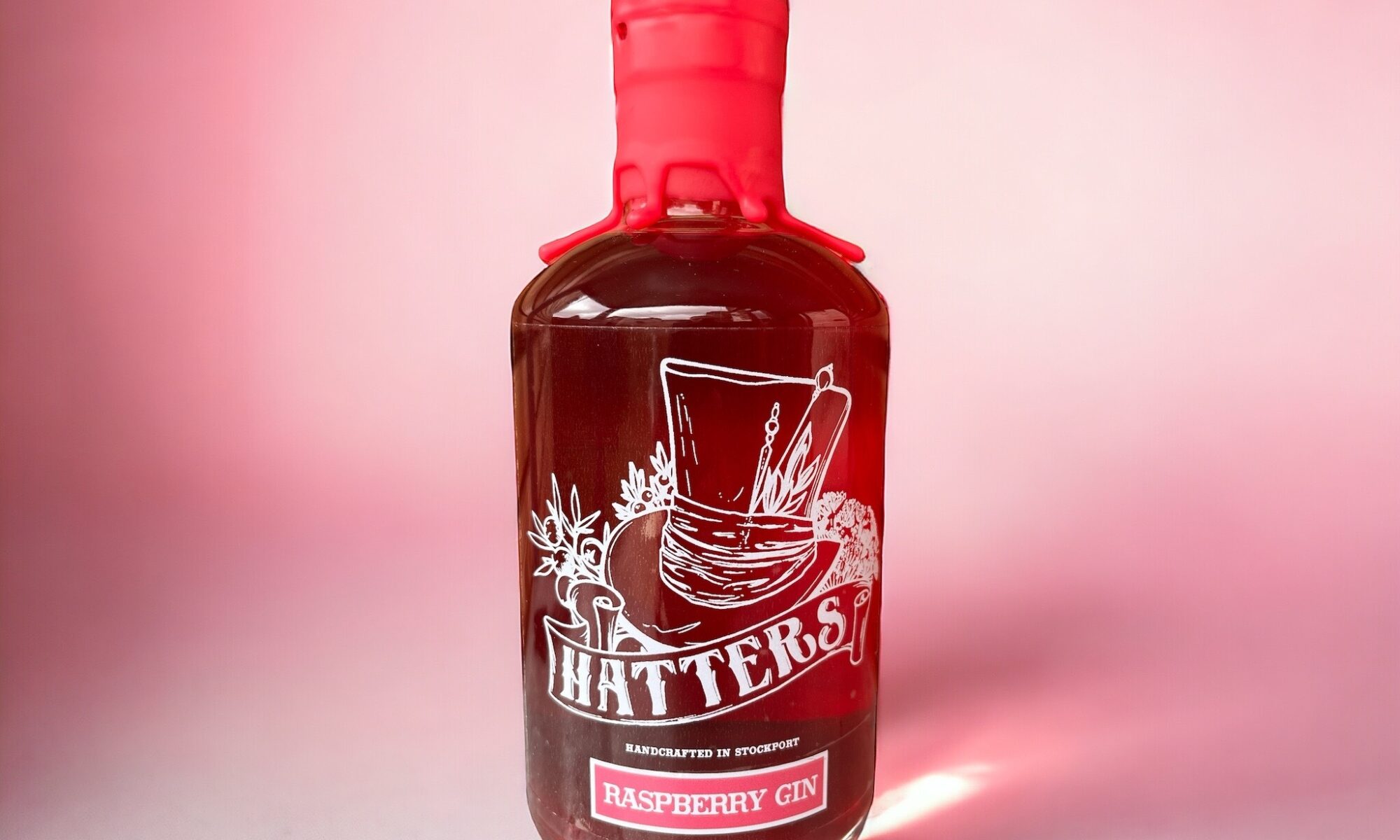Hatters Raspberry Gin bottle pink